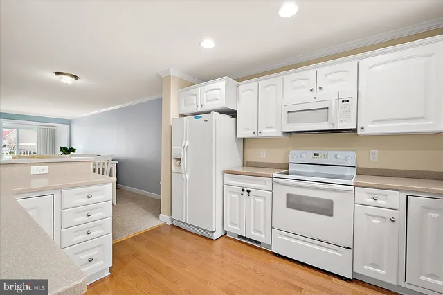 a room with a bed and a chair