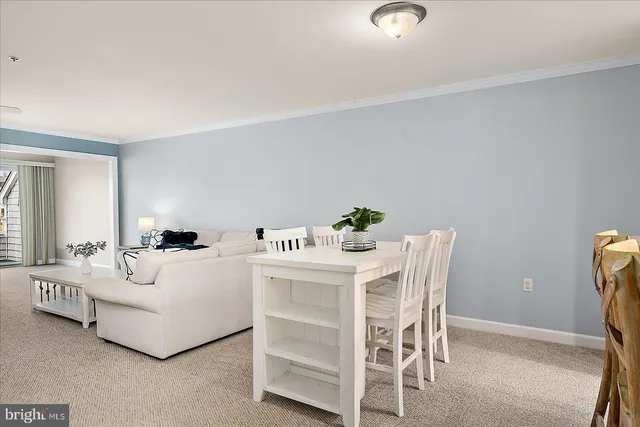 a bed room with a bed and a ceiling fan