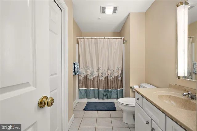 a view of a lake with a city from a balcony