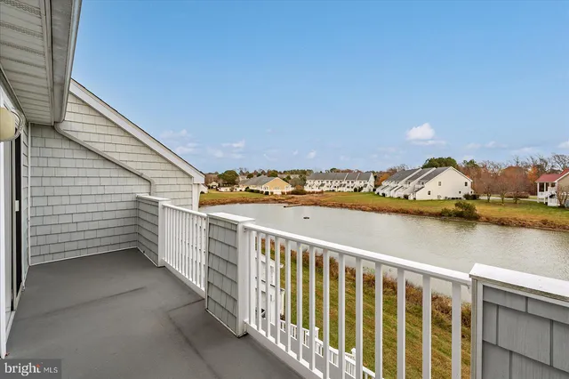 a front view of a house with a garage