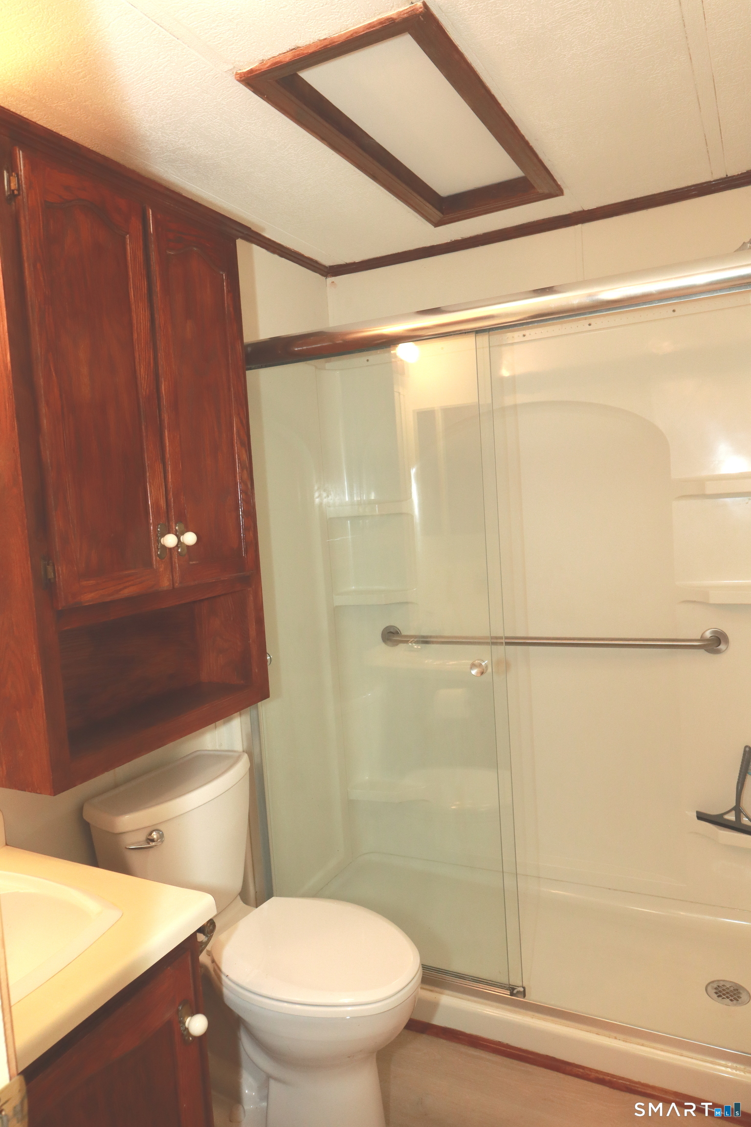 126 Williams Road Montville, CT 06370 - Photo 27 of 31 Renovated full bath with walk in shower for easy entry and glass doors