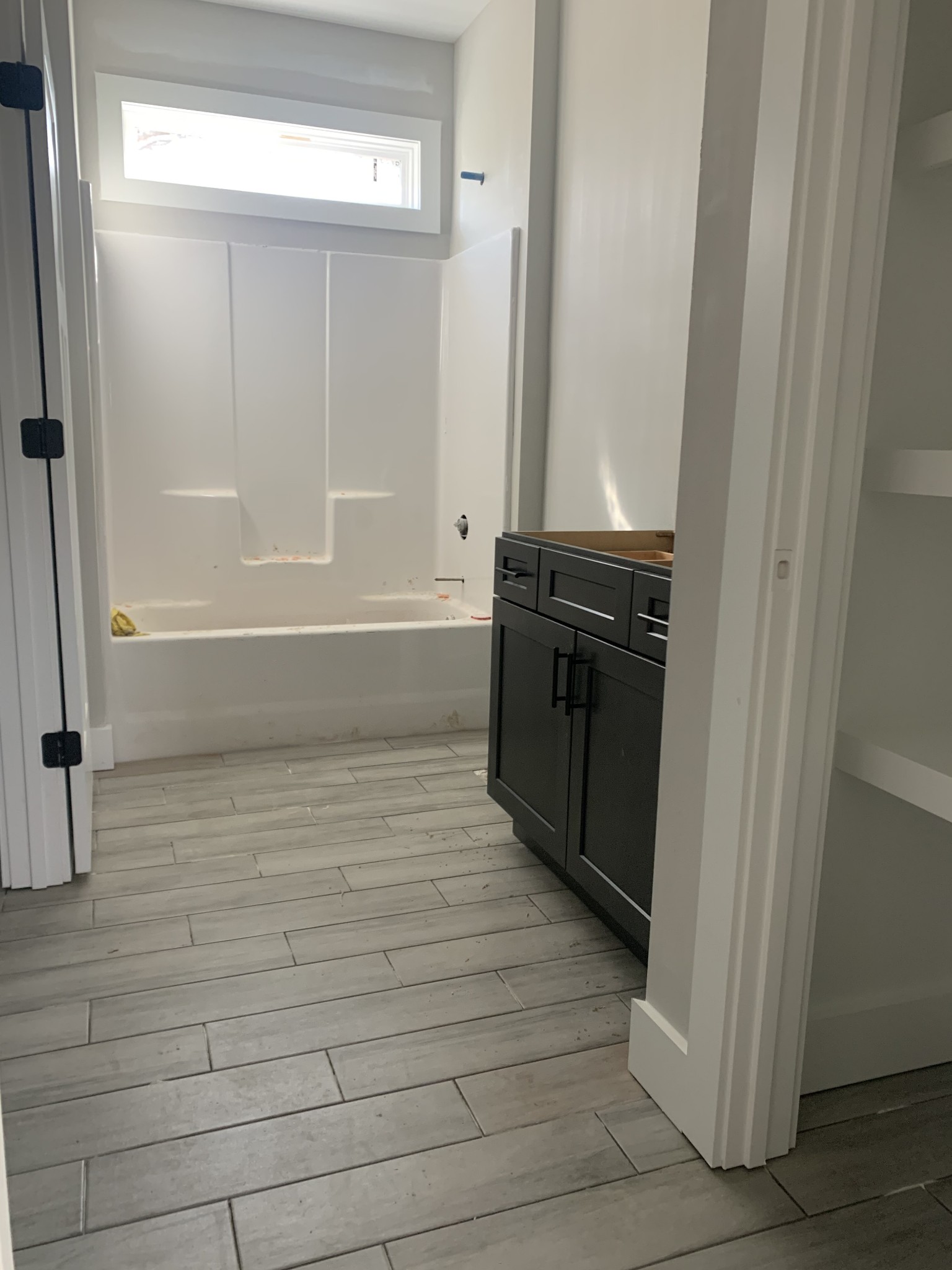 5249 Hugh Woodard Road Springfield, TN 37172 - Photo 7 of 11 a bathroom with a bathtub and shower