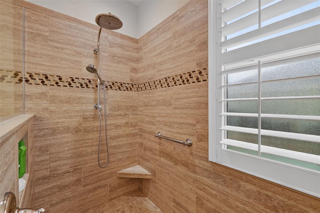 9611 Southwest 71st Loop Ocala, FL 34481 - Photo 19 of 31 a bathroom with a toilet and a shower
