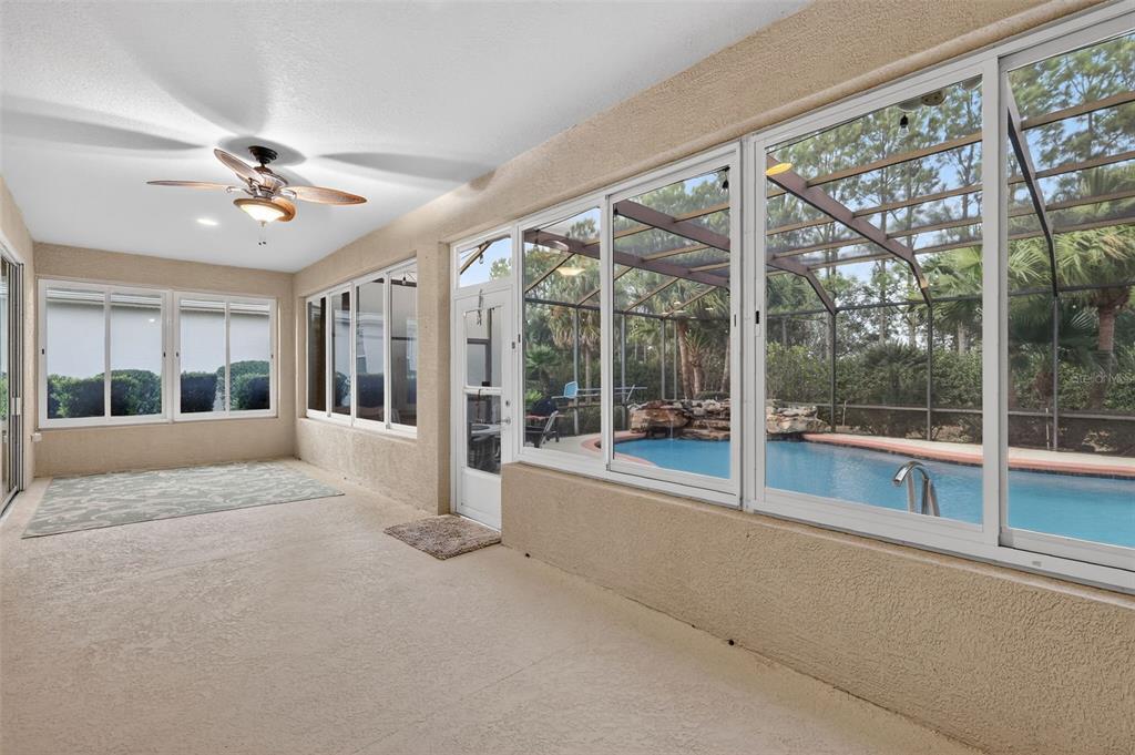 9611 Southwest 71st Loop Ocala, FL 34481 - Photo 25 of 31 a view of an empty room with a balcony