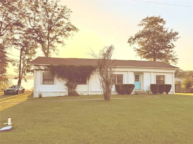 front view of a house with yard