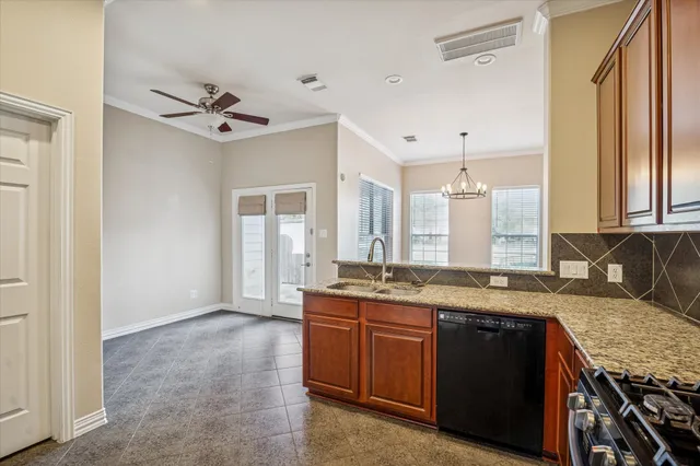 a spacious bathroom with a granite countertop sink mirror and a