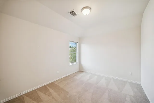 a bathroom with a double vanity sink toilet mirror and bathtub