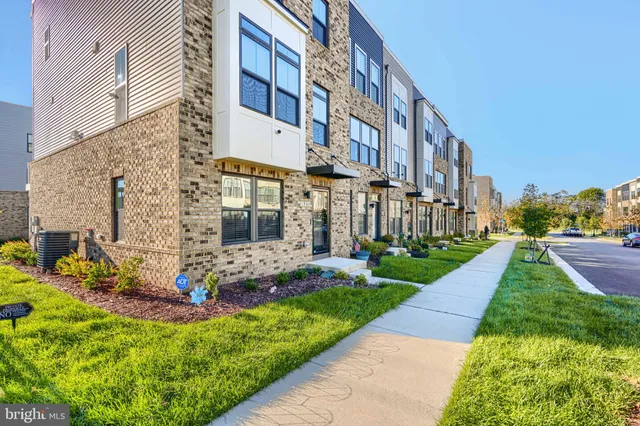 a view of a building with a yard