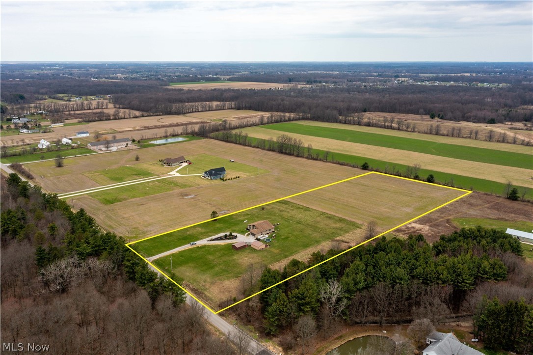 36220 Neff Road Grafton, OH 44044 - Photo 48 of 50 Aerial view of sparsely populated area with property parcel outlined and rows of crops