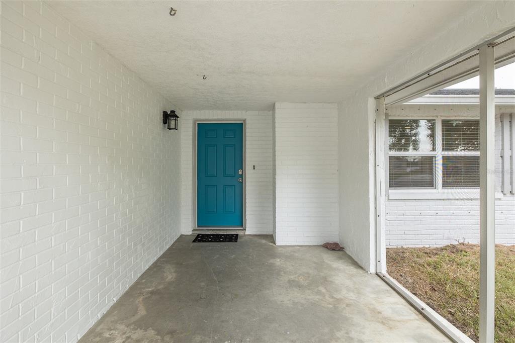 7437 Daggett Terrace New Port Richey, FL 34655 - Photo 11 of 38 an empty room with windows