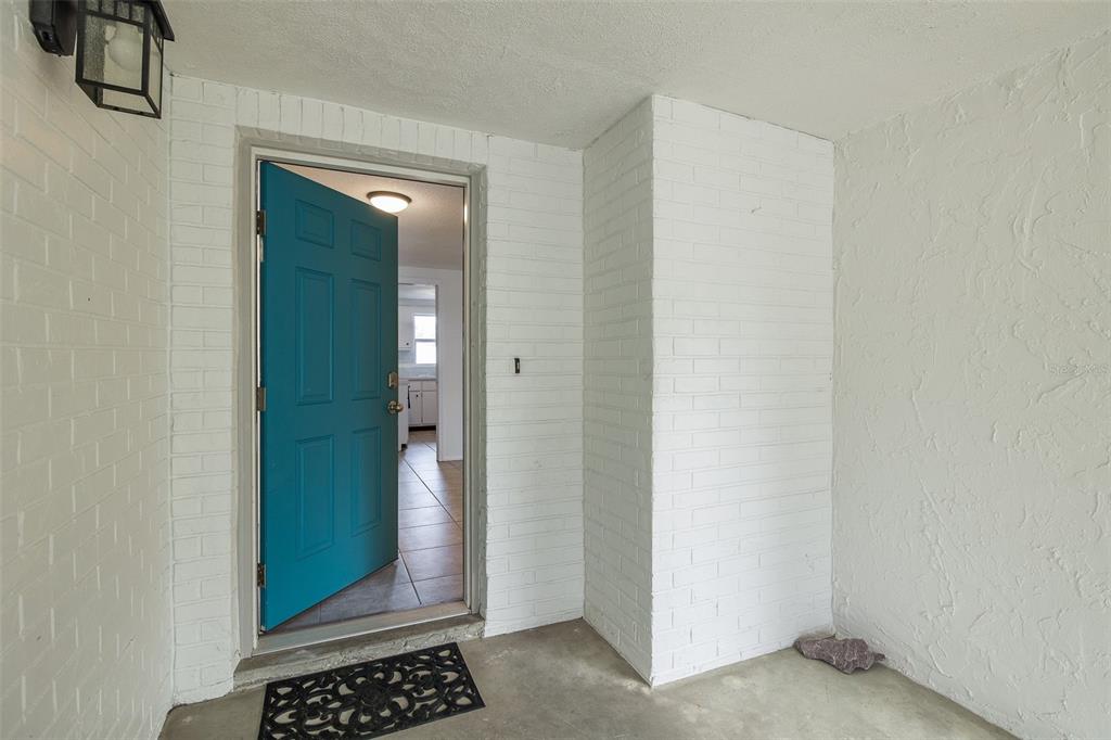 7437 Daggett Terrace New Port Richey, FL 34655 - Photo 12 of 38 a view of a bathroom with sink and mirror