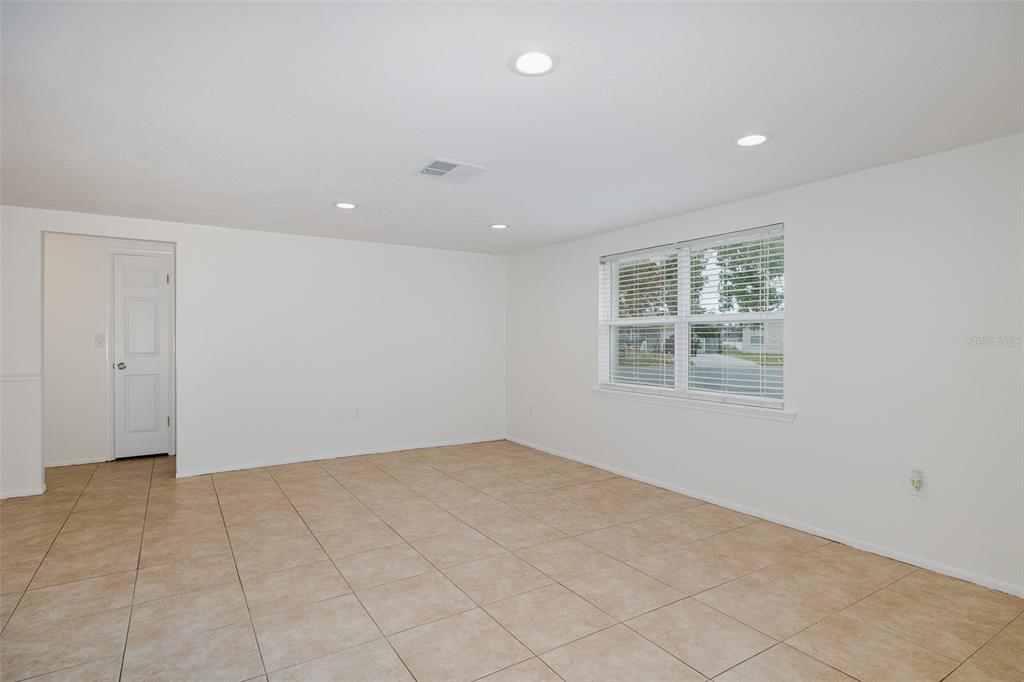7437 Daggett Terrace New Port Richey, FL 34655 - Photo 15 of 38 an empty room with windows