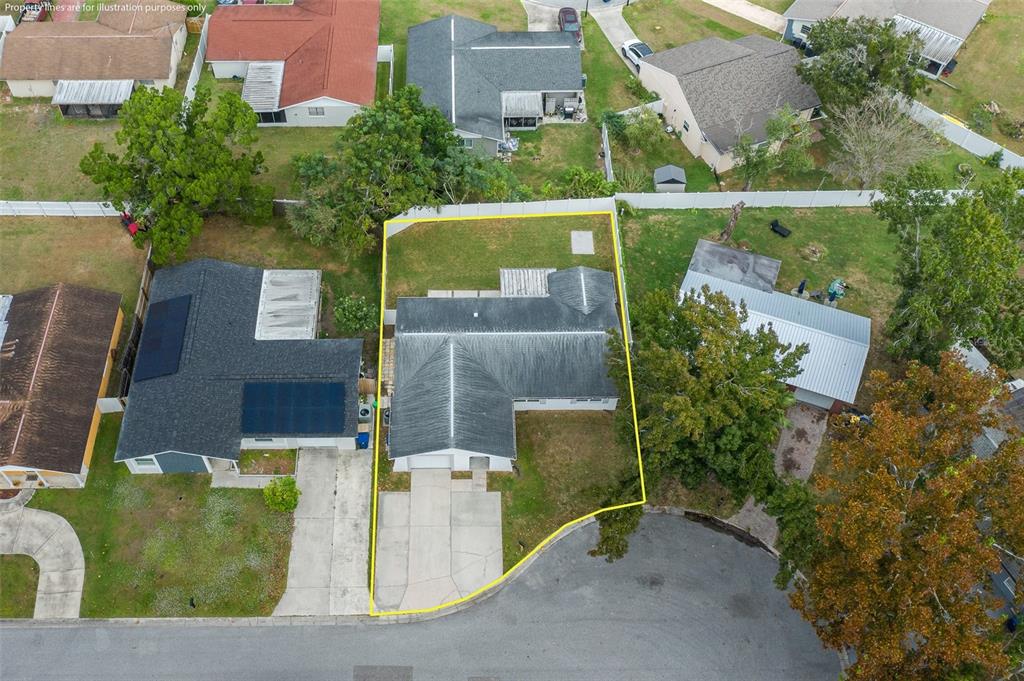 7437 Daggett Terrace New Port Richey, FL 34655 - Photo 30 of 38 front view of a house with a yard