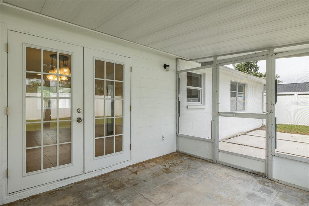 7437 Daggett Terrace New Port Richey, FL 34655 - Photo 33 of 38 an empty room with windows