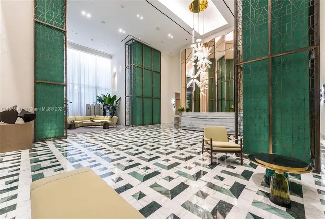 a view of a patio with couches table and chairs and potted plants