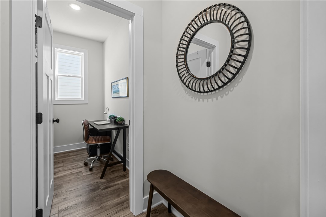 135 Bowers Estates Road Hartwell, GA 30643 - Photo 22 of 35 This dedicated workspace offers a quiet retreat for productivity, featuring durable wood flooring and ample natural light.