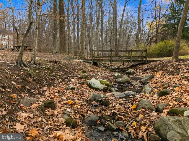 a view of a backyard of the house