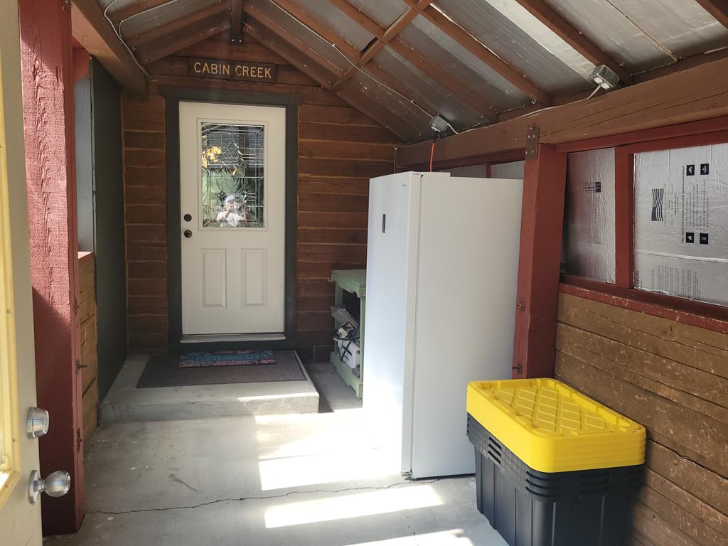 10346 Emma Loop Cascade, ID 83611 - Photo 9 of 43 Enclosed breezeway