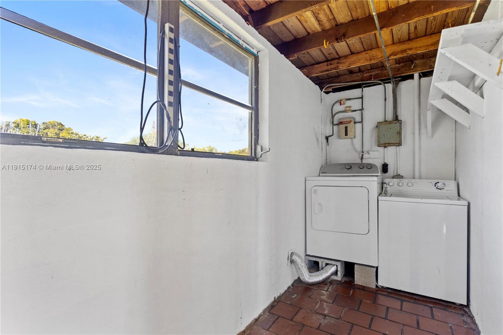 10605 Southwest 112th Street Miami, FL 33176 - Photo 36 of 44 a utility room with dryer and washer