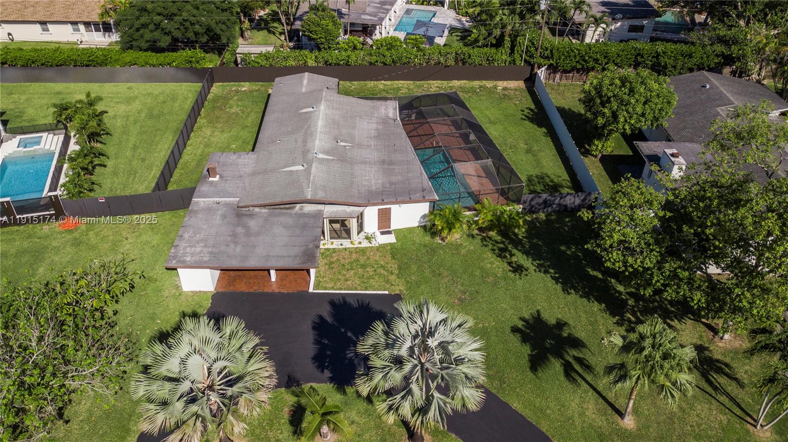 10605 Southwest 112th Street Miami, FL 33176 - Photo 38 of 44 an aerial view of a house with a garden