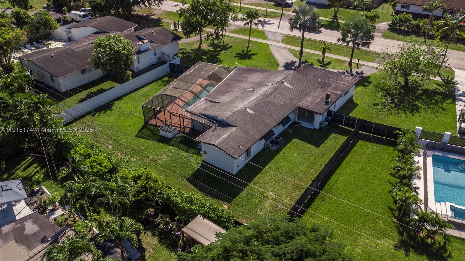 10605 Southwest 112th Street Miami, FL 33176 - Photo 43 of 44 an aerial view of a house with a garden
