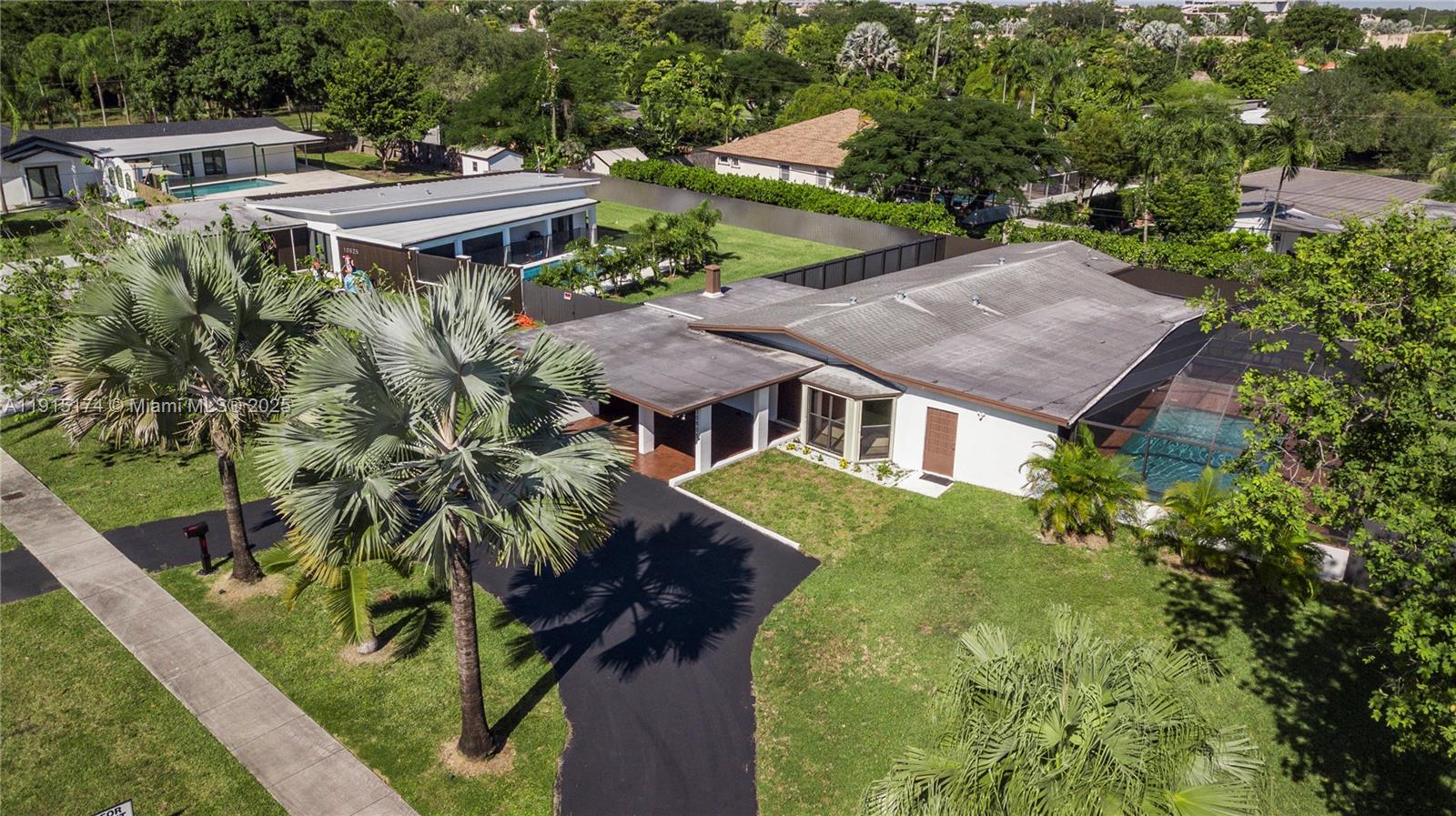 10605 Southwest 112th Street Miami, FL 33176 - Photo 44 of 44 a aerial view of a house