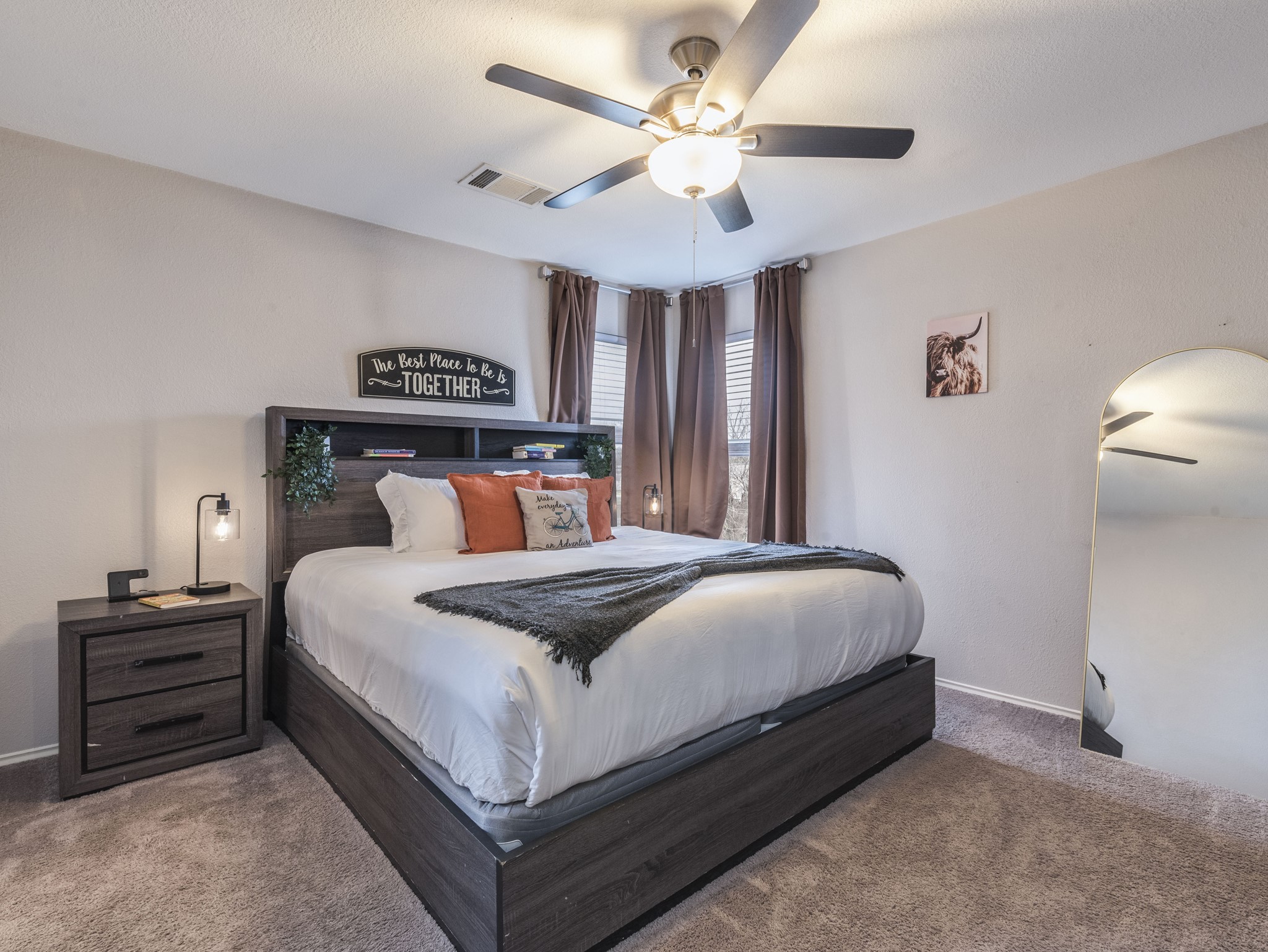 1415 Roxanne's Run Pflugerville, TX 78660 - Photo 17 of 30 Comfortable bedroom with a ceiling fan, plush carpet, and ample natural light.