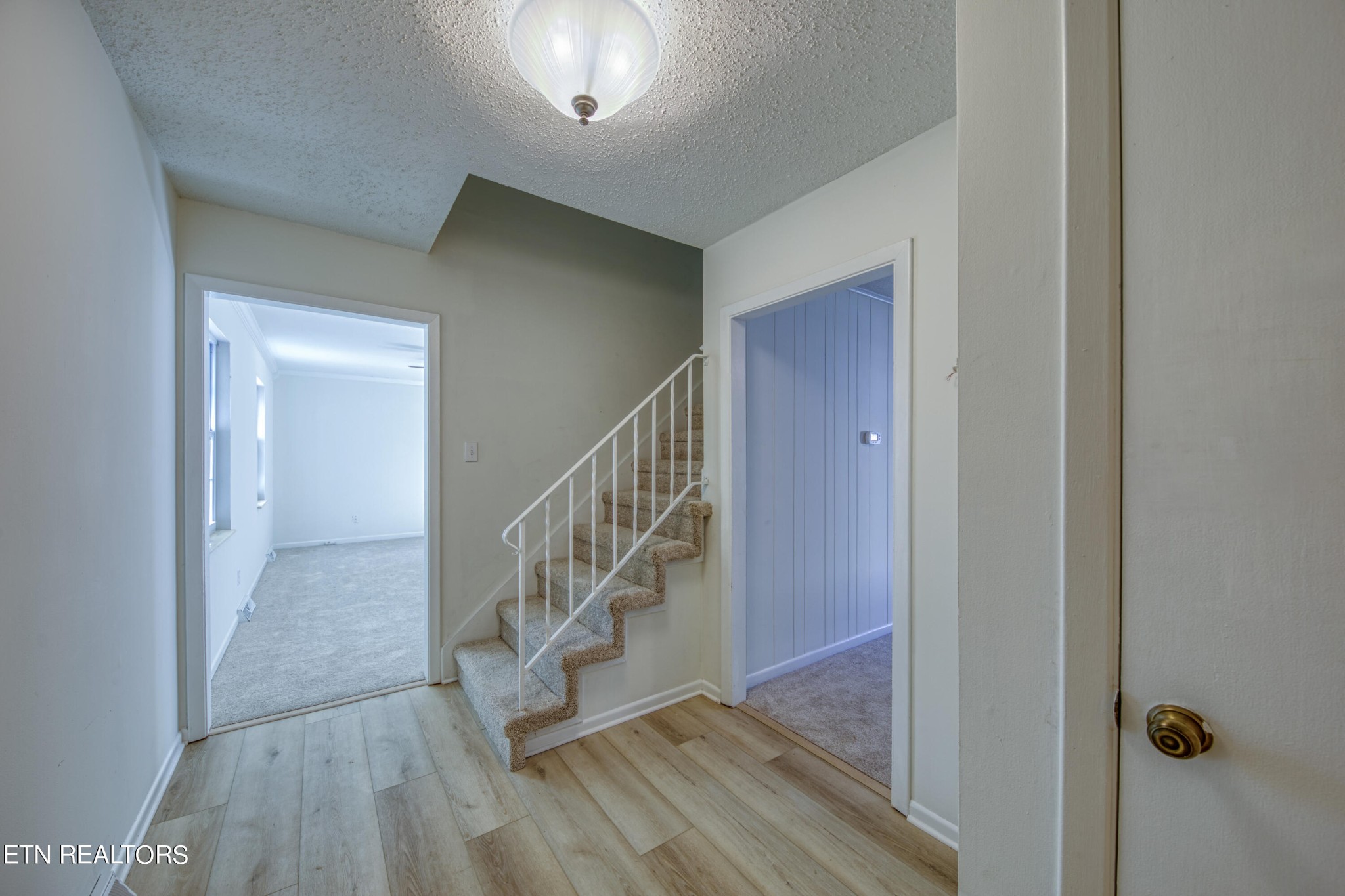 7329 Joyce Lane Powell, TN 37849 - Photo 11 of 28 a view of entryway with wooden floor
