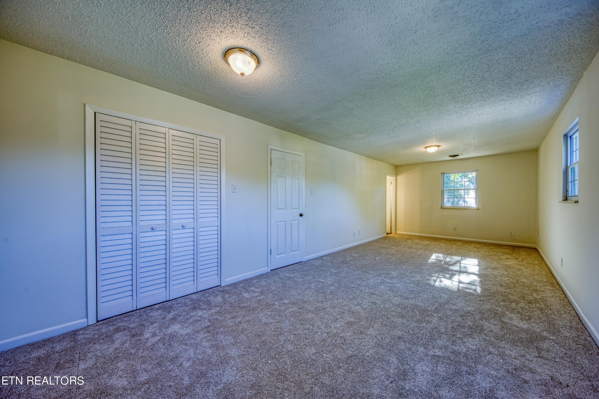 7329 Joyce Lane Powell, TN 37849 - Photo 12 of 28 a view of an empty room and window