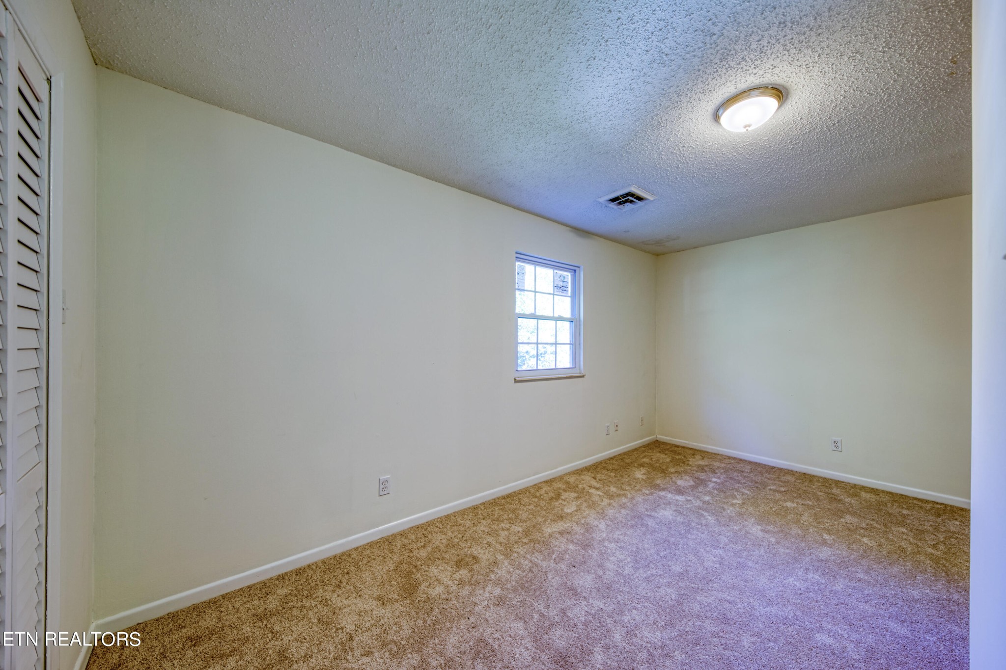 7329 Joyce Lane Powell, TN 37849 - Photo 16 of 28 a view of an empty room with a window