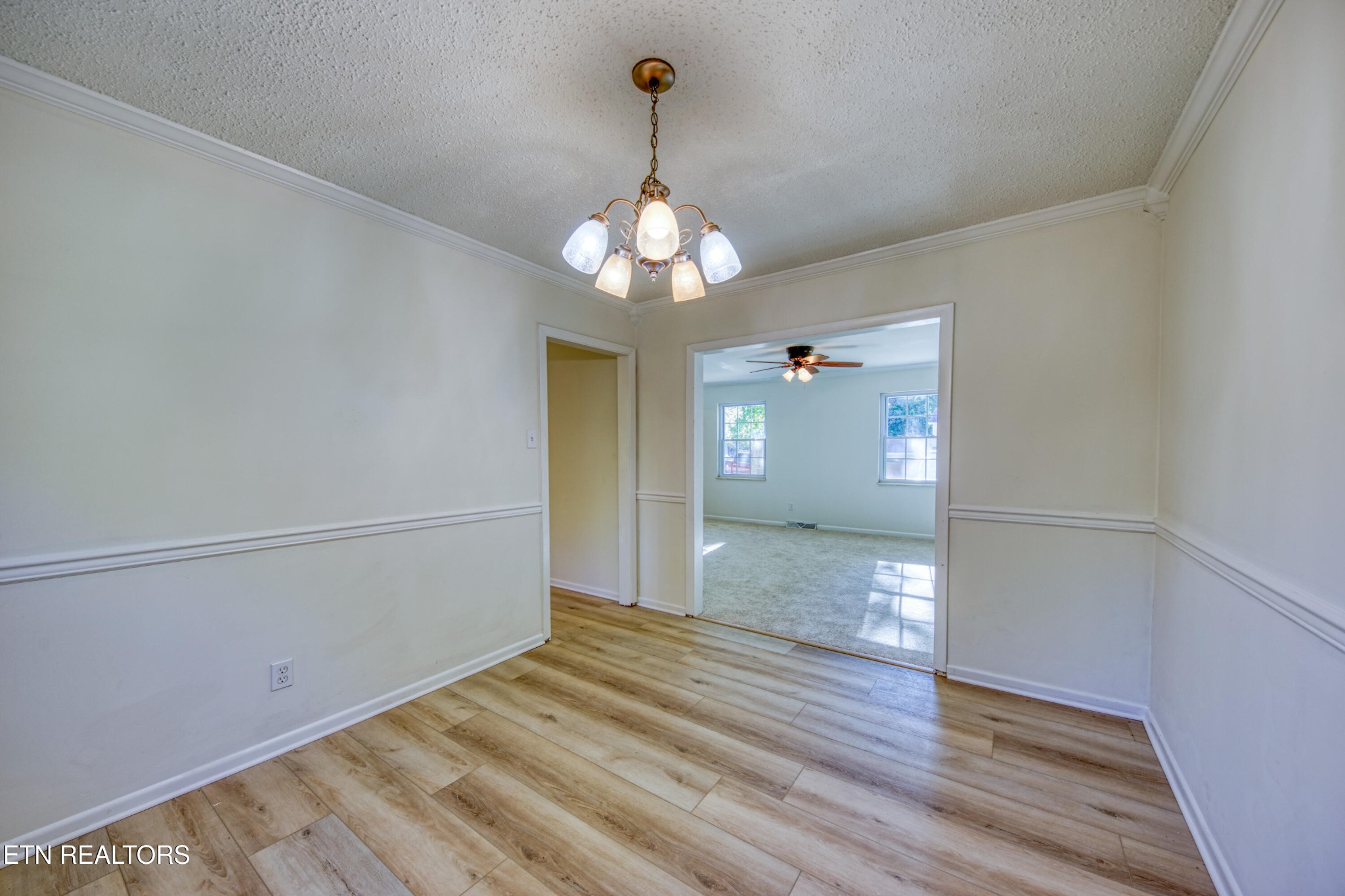 7329 Joyce Lane Powell, TN 37849 - Photo 6 of 28 a view of a livingroom with wooden floor