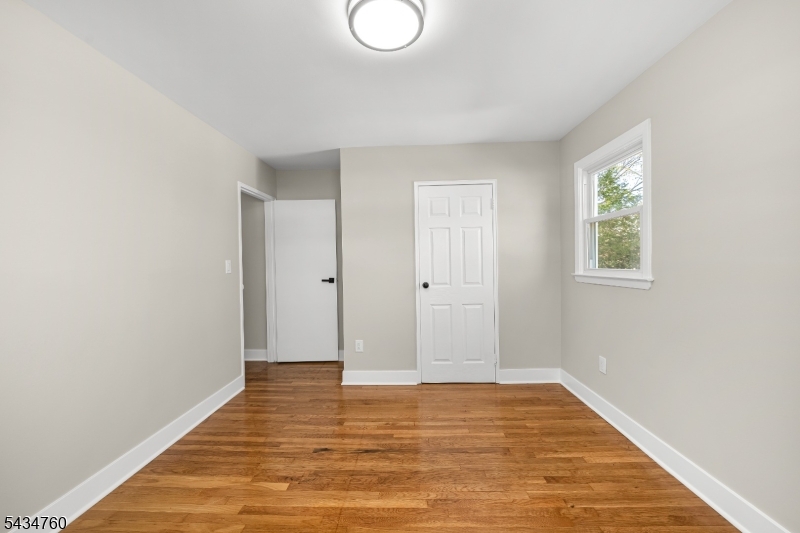641 Ydv-ham Sq Road Robbinsville, NJ 08691 - Photo 17 of 49 a view of room with window and wooden floor