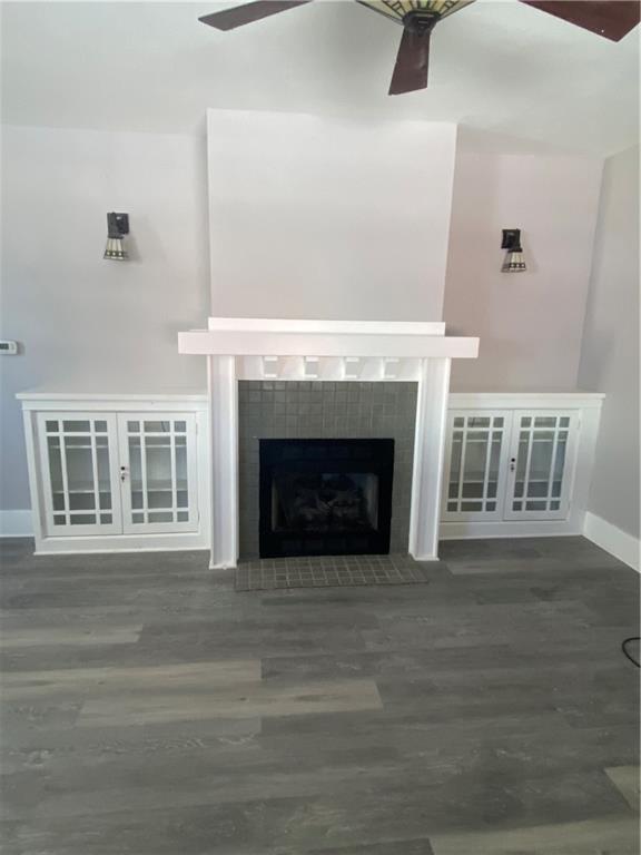 311 South 3rd Avenue Elizabeth, PA 15037 - Photo 9 of 30 a view of an empty room with wooden floor and a fireplace