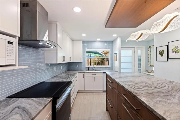 $695,000 | 479 Boca Ciega Point Boulevard South, Unit 1205, St. Petersburg, FL 33708