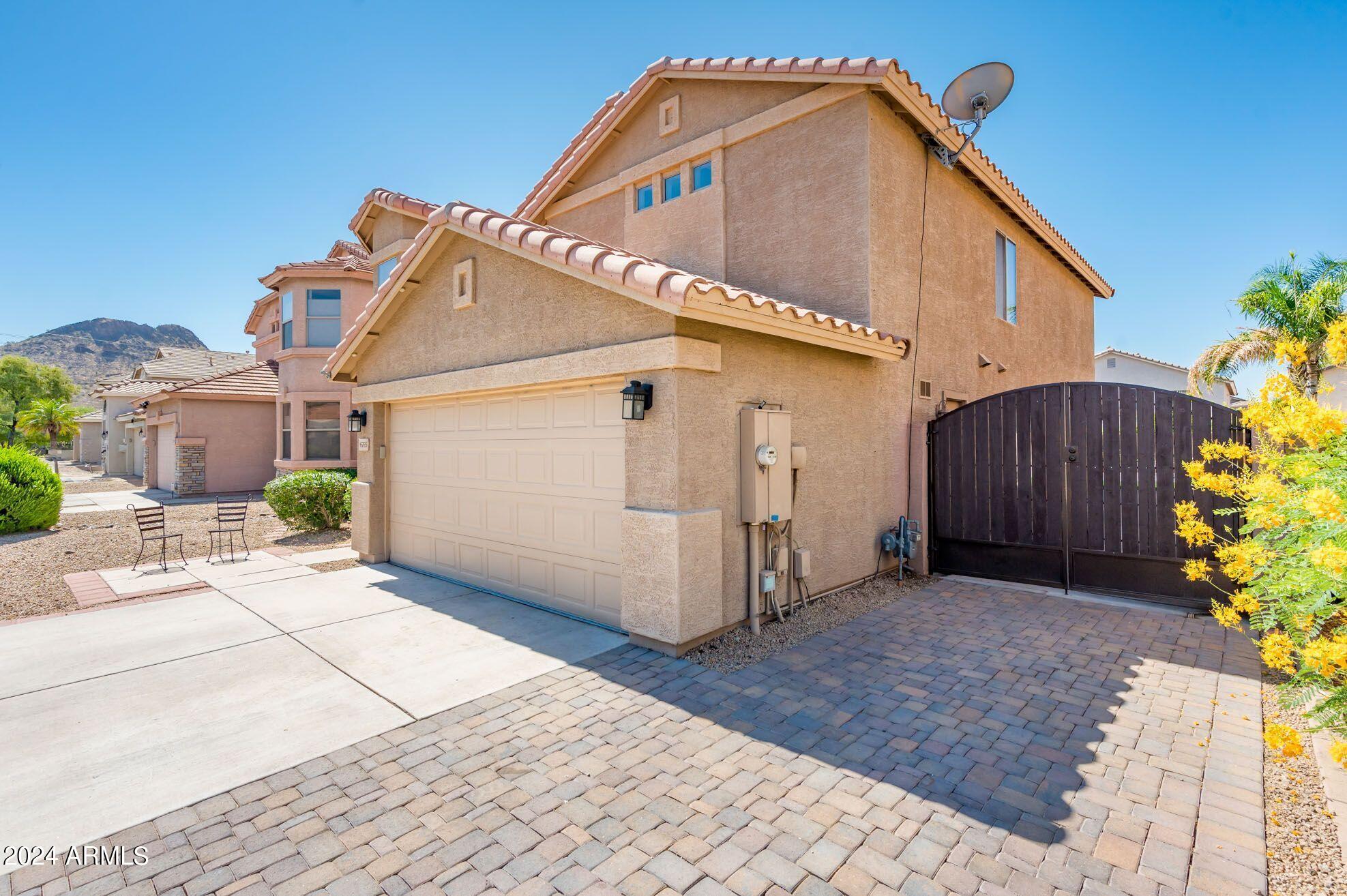 6765 West Rowel Road Peoria, AZ 85383 - Photo 3 of 41 6765 W Rowel Rd - Front RV Gate