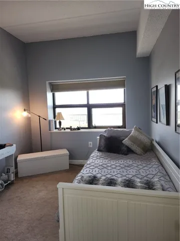 a living room with furniture and window