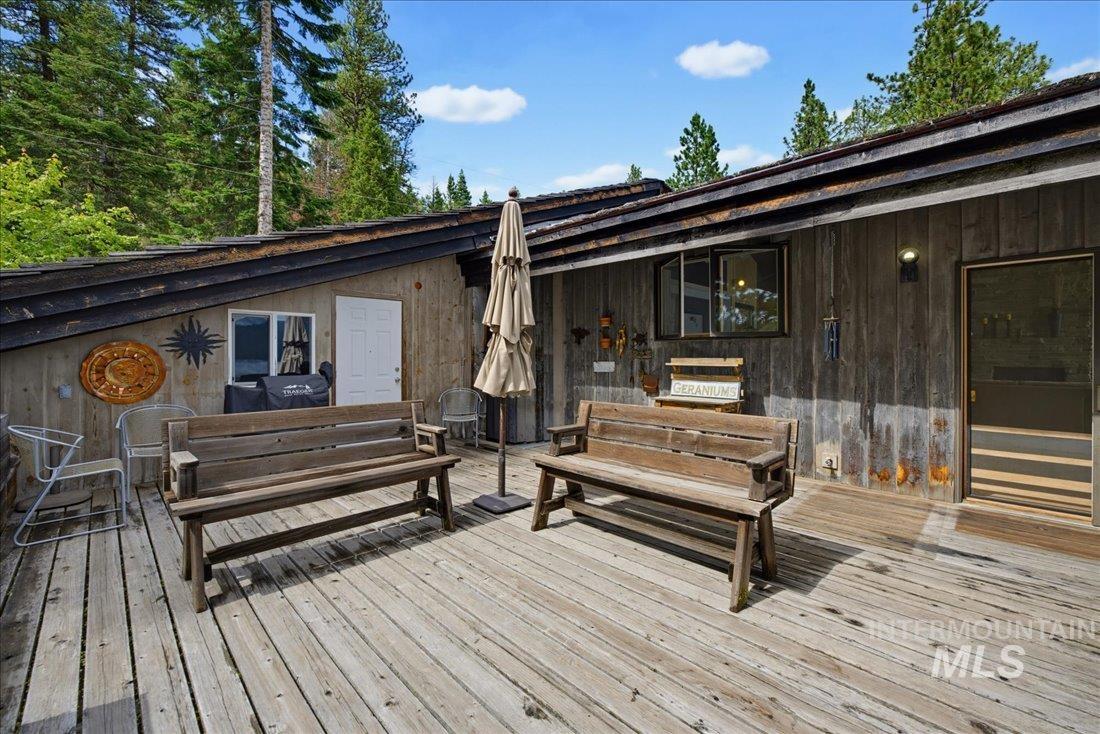 3800 Warren Wagon Road McCall, ID 83638 - Photo 31 of 50 Expansive wood plank decking with direct access to the dwelling
