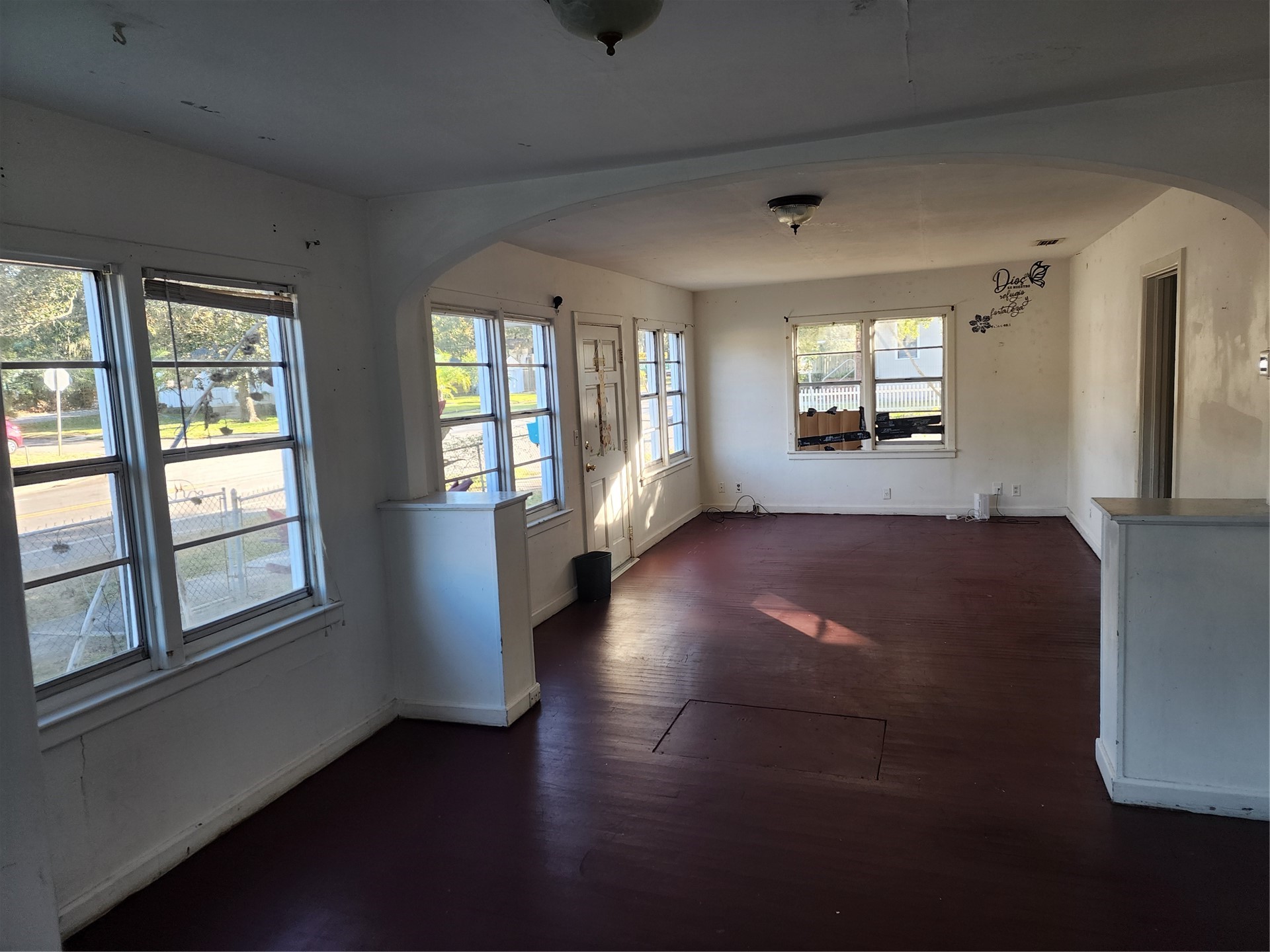 19 Oak Grove Place Fernandina Beach, FL 32034 - Photo 3 of 7 a view of an empty room with wooden floor and windows
