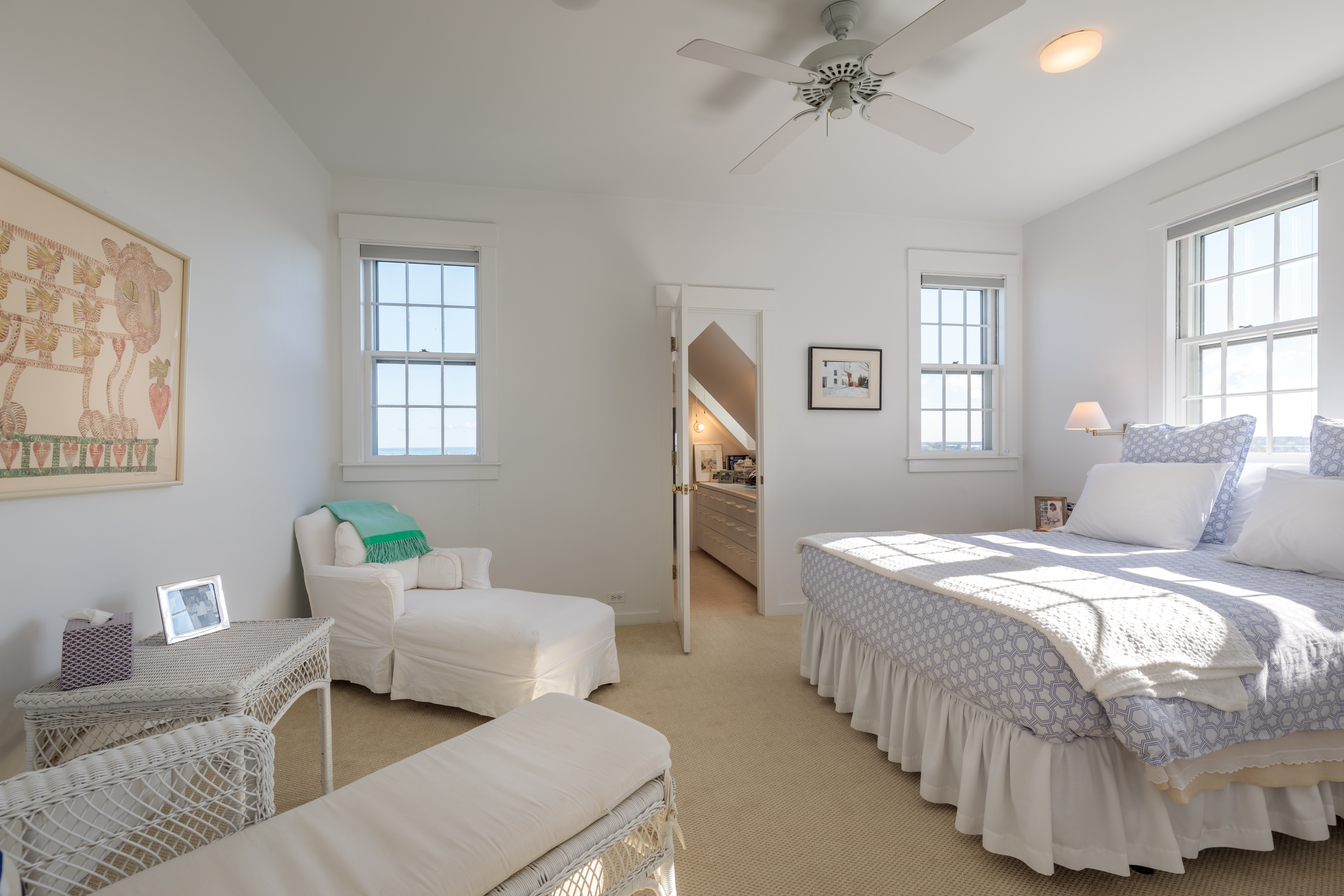 33 Cliff Road Nantucket, MA 02554 - Photo 49 of 84 a bedroom with a bed and wooden floor
