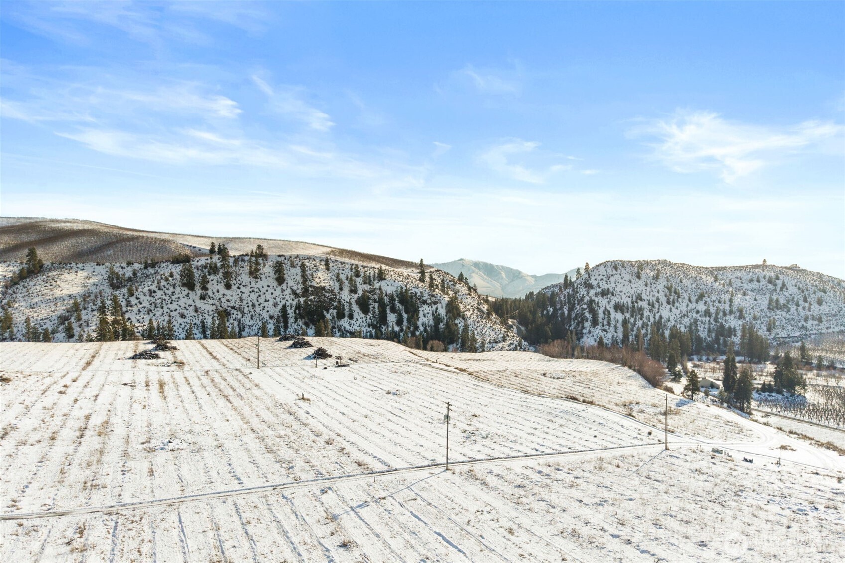 0 Boyd Loop Road Manson, WA 98831 - Photo 12 of 17 a view of a backyard of snow