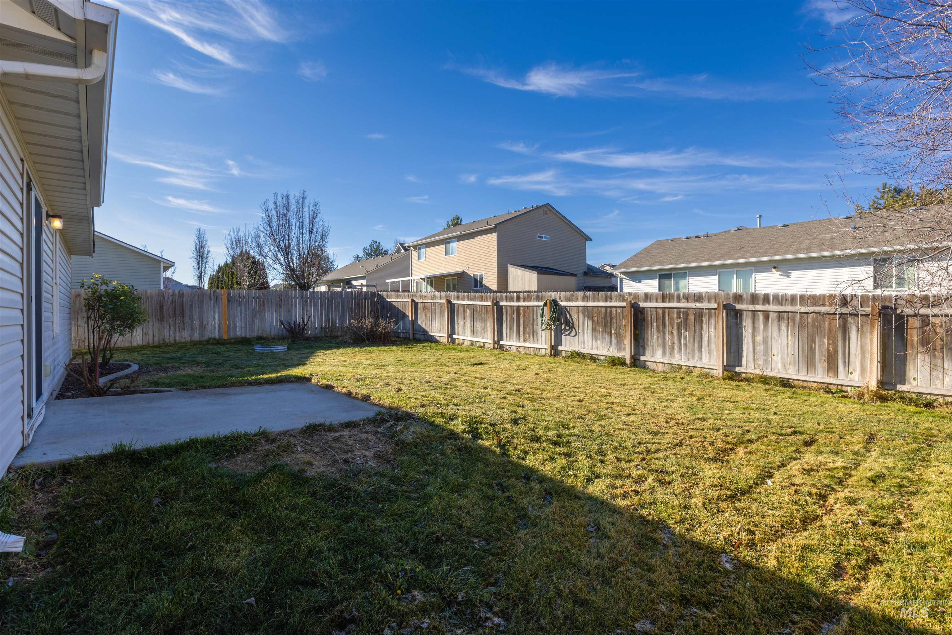16535 Chino Avenue Caldwell, ID 83607 - Photo 24 of 26 Fenced backyard featuring a patio area and a residential view