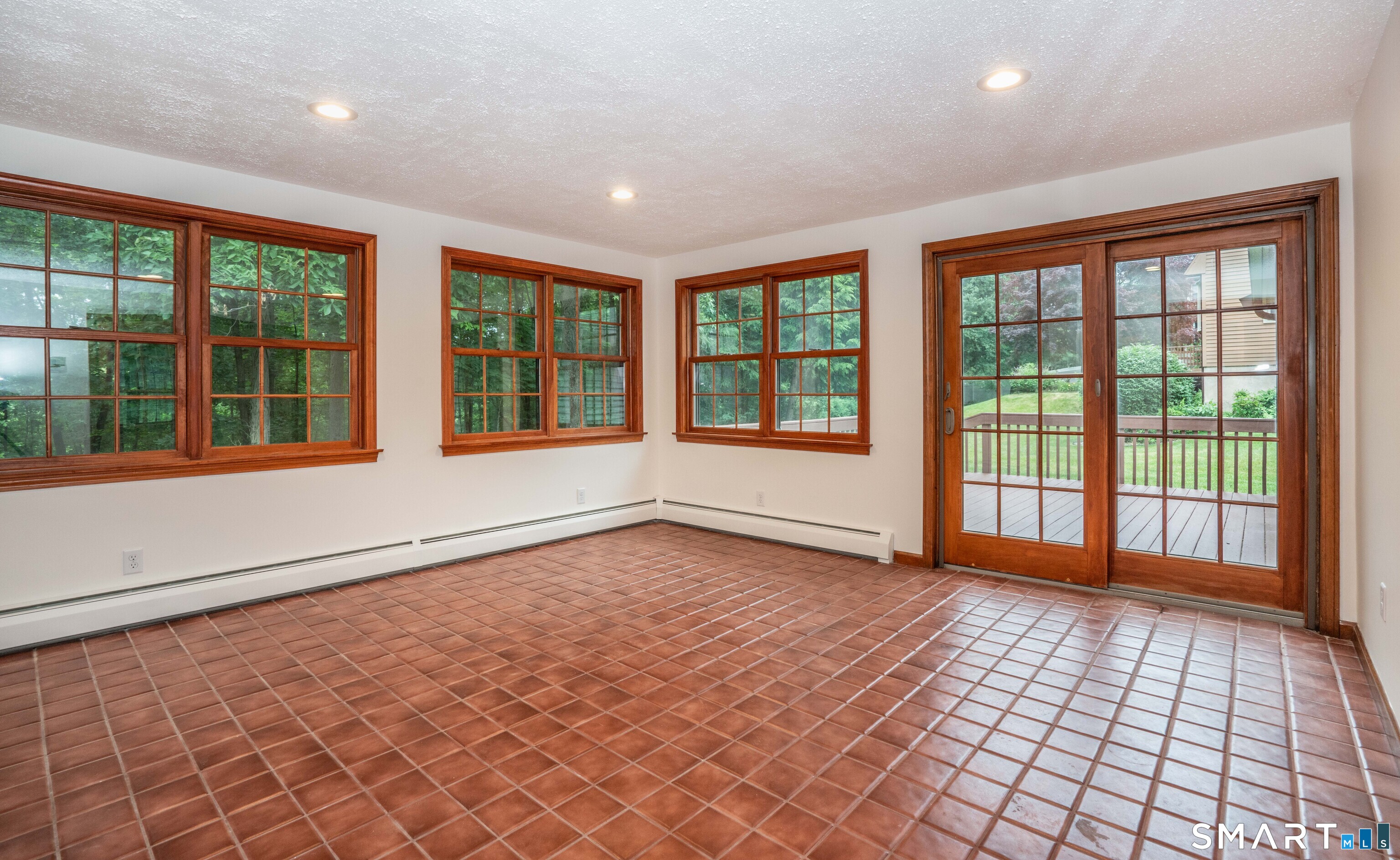 182 Valley View Road Manchester, CT 06040 - Photo 23 of 40 Sun Room with slider to deck