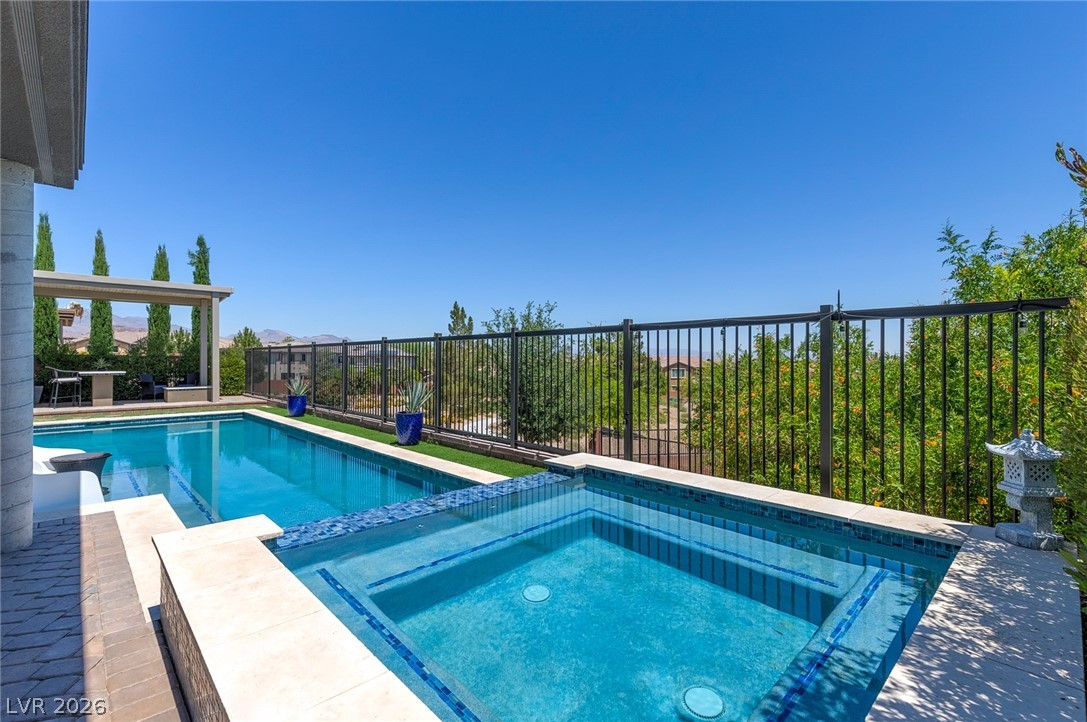6014 Willow Ridge Court Las Vegas, NV 89135 - Photo 68 of 99 Enjoy outdoor living with a private pool, spa, and views of the surrounding landscape.
