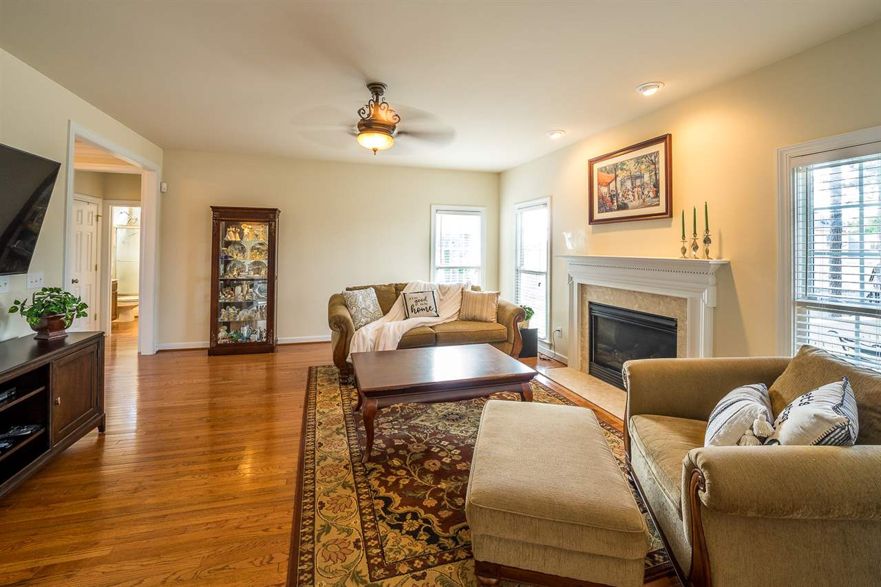 6033 Jones Farm Road Wake Forest, NC 27587 - Photo 12 of 30 Large and open living room with beautiful fireplace and open to the kitchen. Living Room