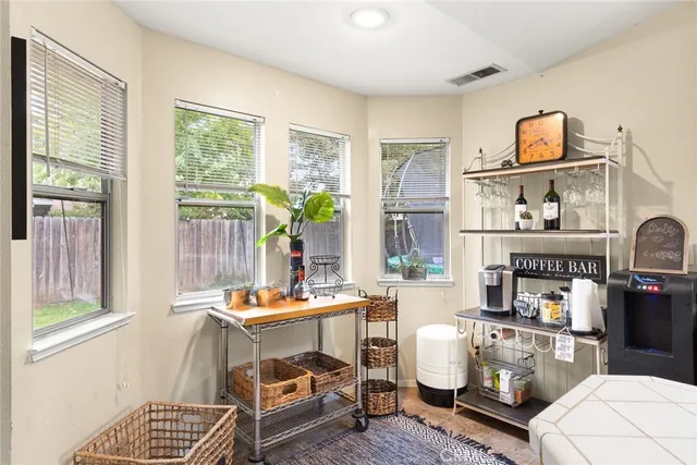 a room with furniture and a window