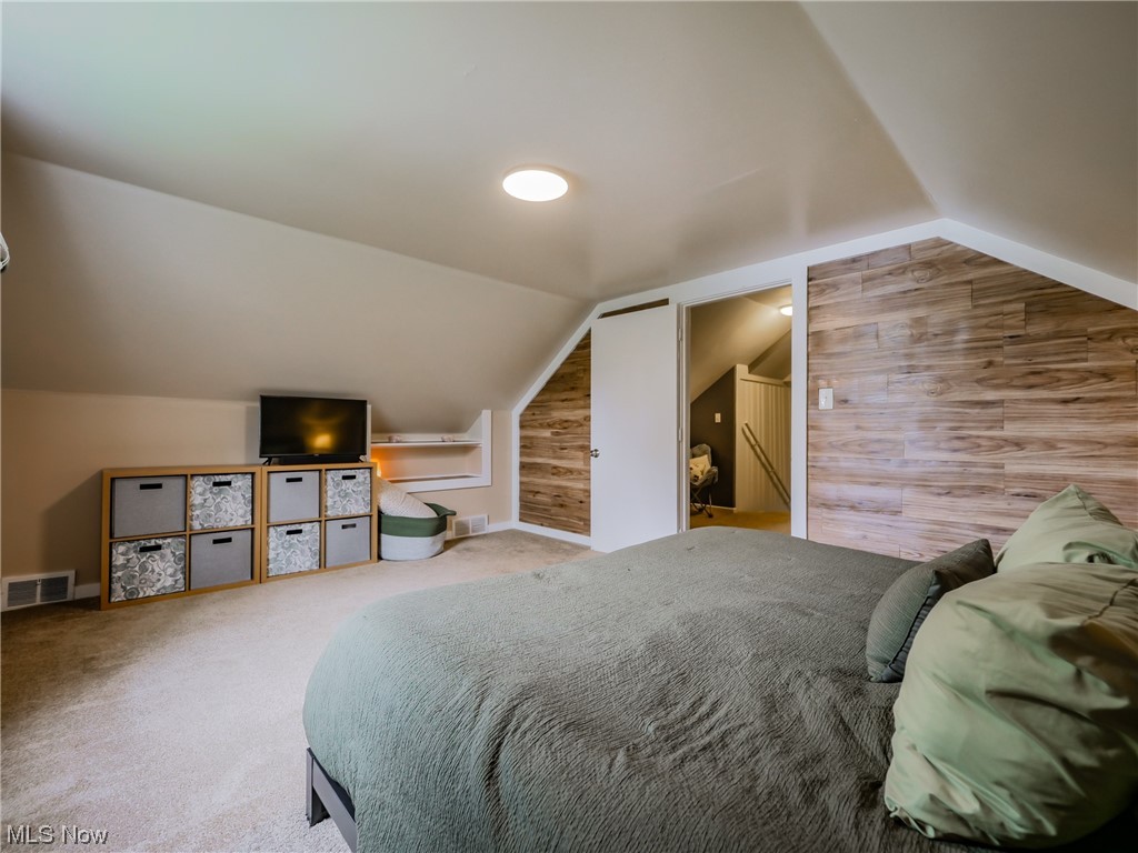 1240 Churchill Road Lyndhurst, OH 44124 - Photo 18 of 30 Carpeted bedroom with vaulted ceiling