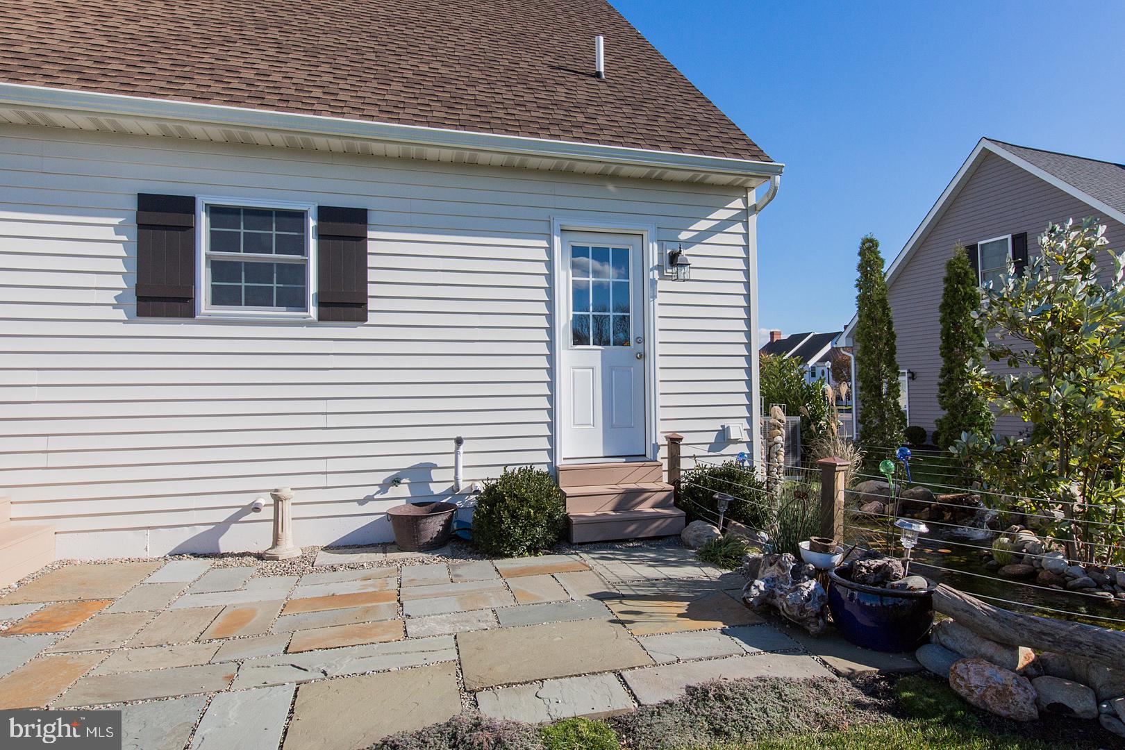 605 Frome Avenue Lititz, PA 17543 - Photo 52 of 54 slate patio with koi pond
