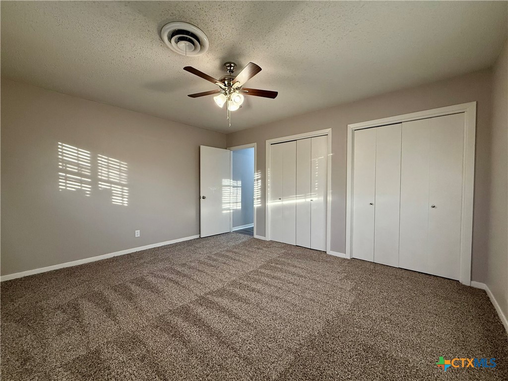 2407 East Airline Road Victoria, TX 77901 - Photo 21 of 38 a view of an empty room with a window