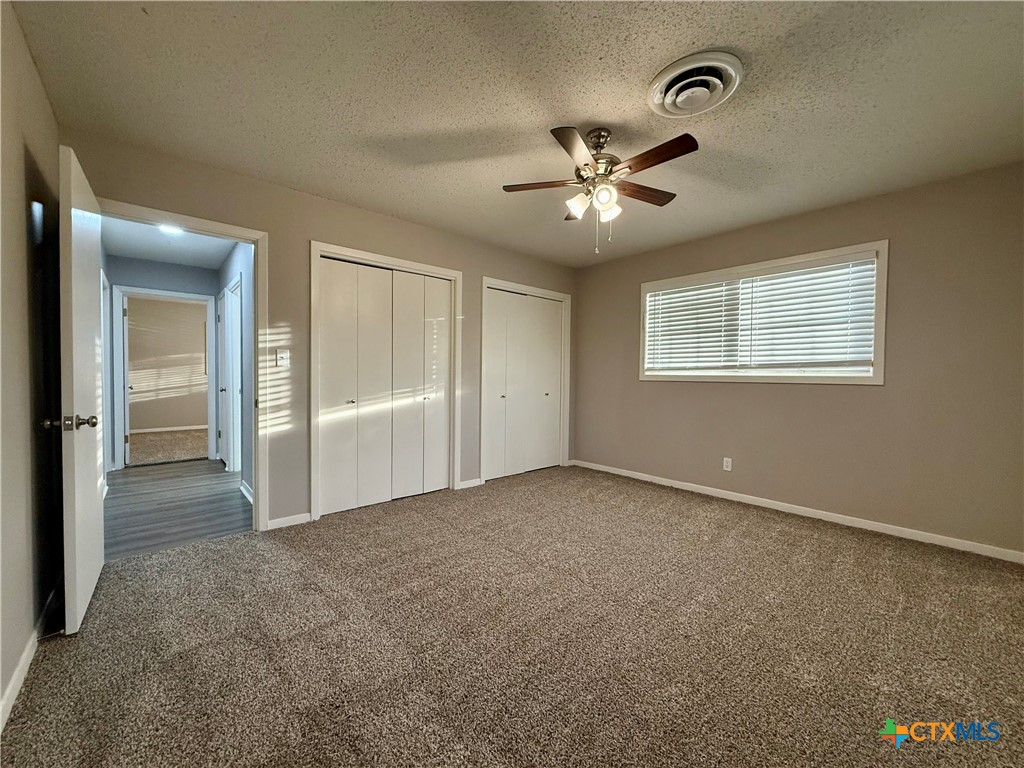 2407 East Airline Road Victoria, TX 77901 - Photo 22 of 38 a view of an empty room with a window
