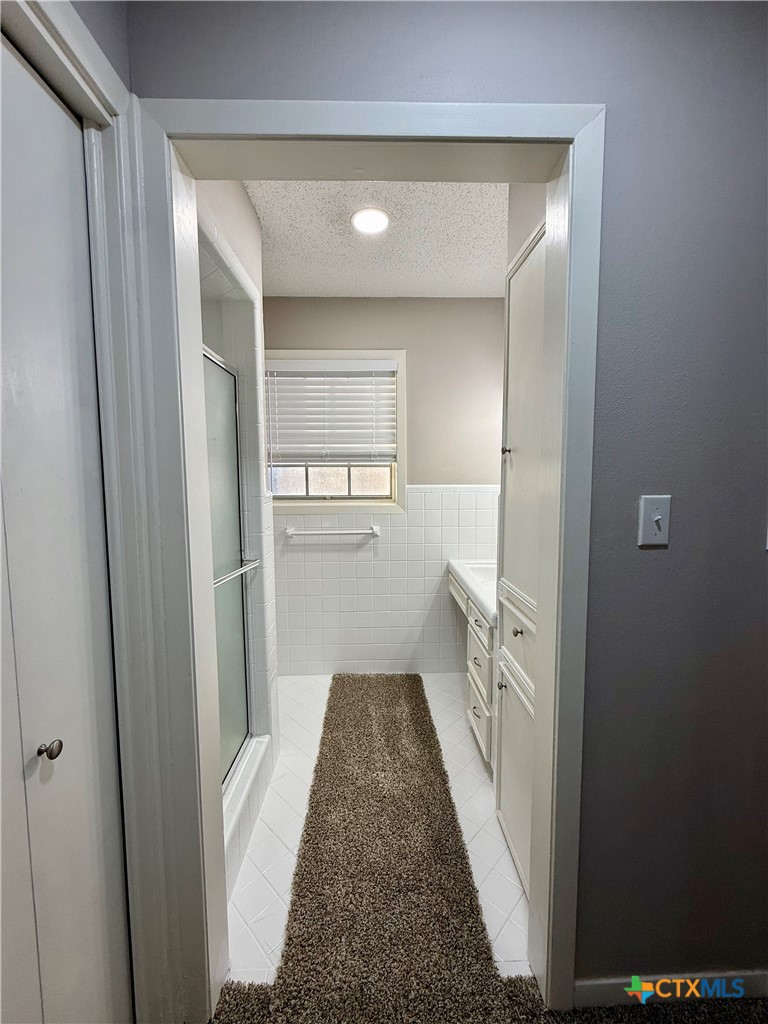 2407 East Airline Road Victoria, TX 77901 - Photo 30 of 38 a view of hallway with wooden floor